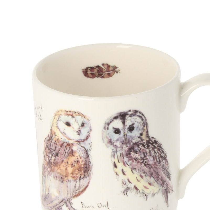 Mug with illustrations of two owls on a white background