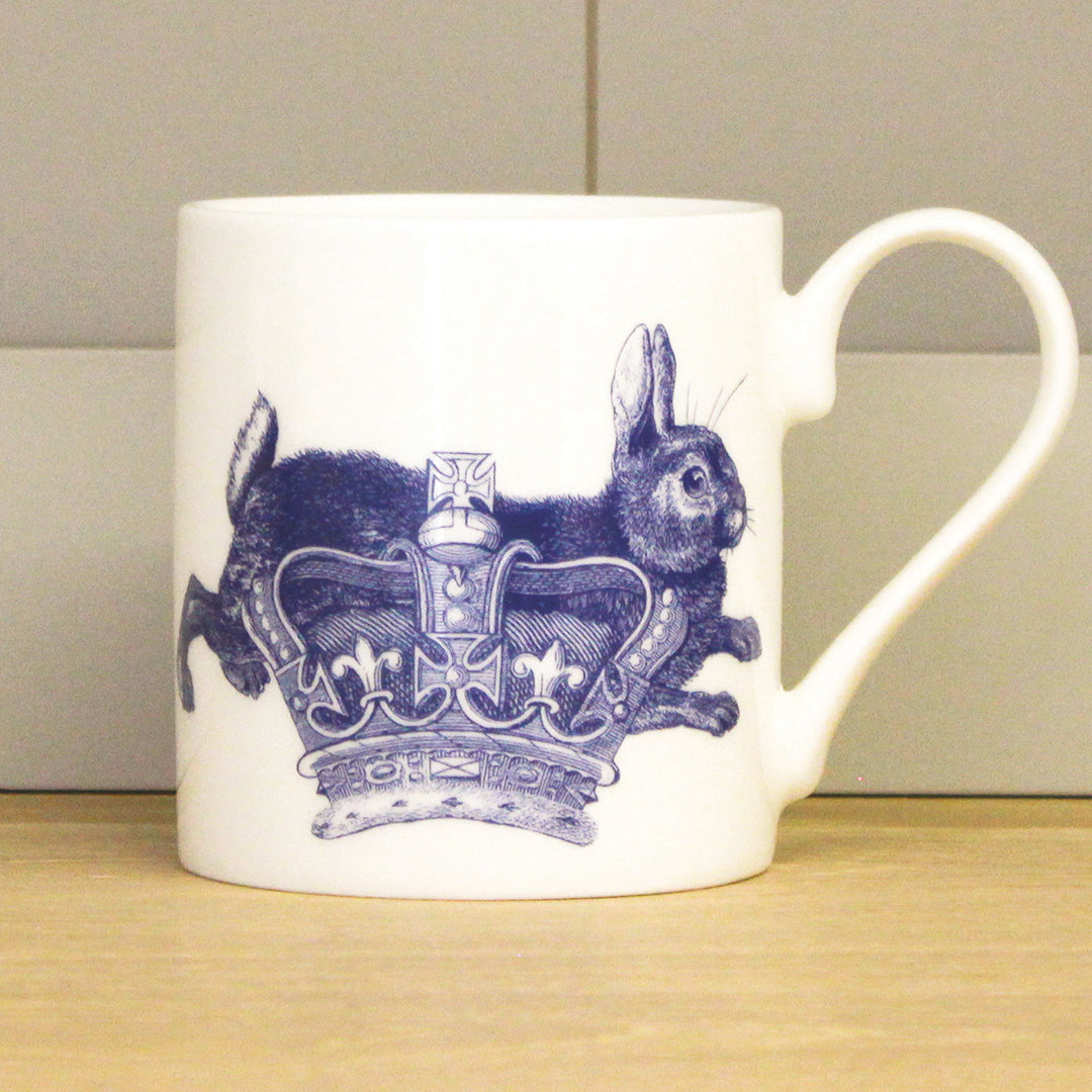 Bone China mug with blue and white design of rabbit and crown
